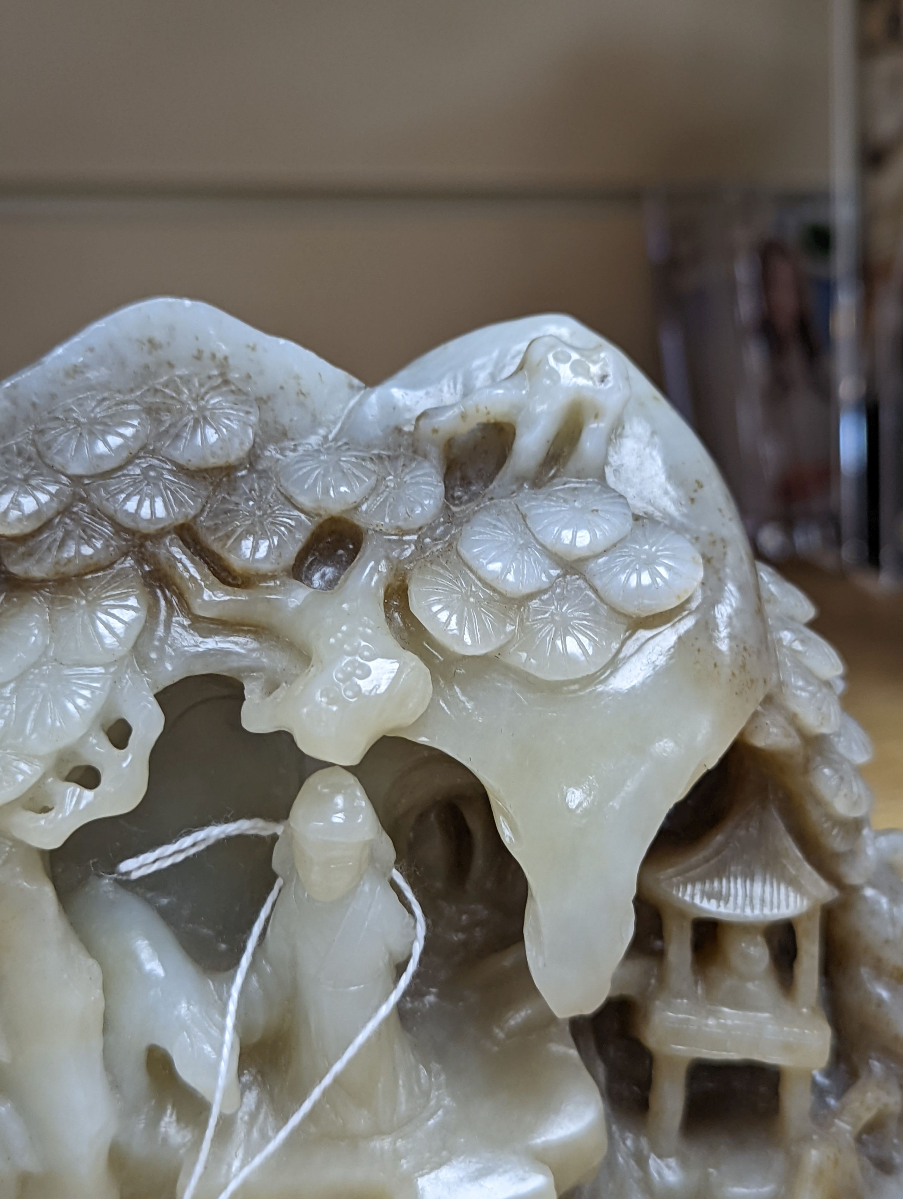 A mountain jade sculpture, 12cm high, together with other Chinese ceramics
